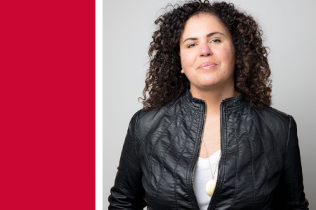 Safiya Noble stands smiling at the camera. Against a red background is a white banner with text reading “Dean’s Lecture on Information + Society.” Text underneath: “An evening with Safiya Noble. November 15, 6:30pm PT. Room 1200-1500, Segal Building, SFU 