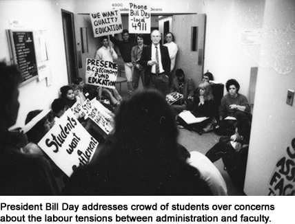 President Bill Day addresses crowd of students over concerns about the labour tensions between administration and faculty.