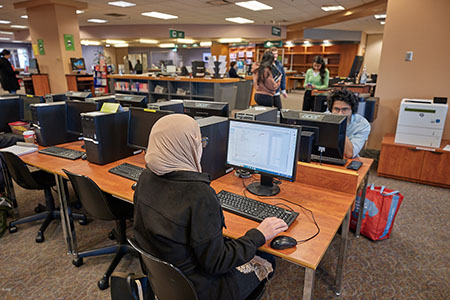 Photograph of students using desktop computers at Coquitlam campus library