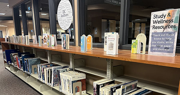 A display of books with a sign reading Study and Wellness Resources
